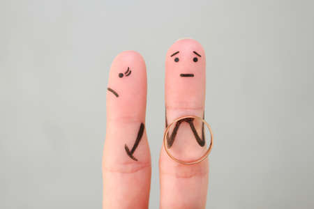 Fingers art of couple. Concept man made an offer to get married, woman refused.の写真素材