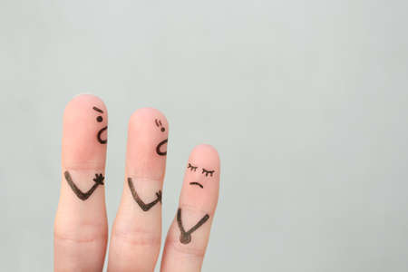 Fingers art of family during quarrel. Concept of parents scold naughty child.の写真素材