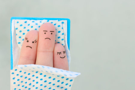 Fingers art of family sleep together. Concept of child prevents parents from sleeping.