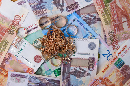 Jewelry on the background of Russian rubles.