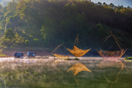 Colorful fishing net in a lakeの写真素材