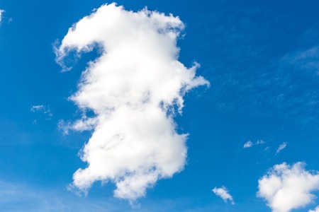 Blue sky background with special shape of cloudの写真素材