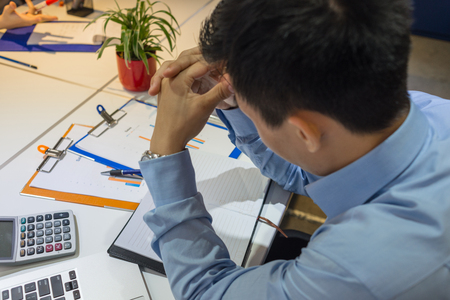 Young businessman thinking about new ideaの写真素材