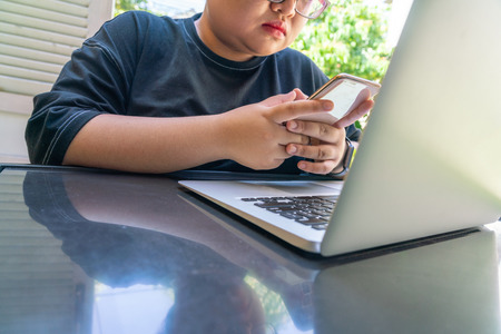 Young woman surfing the Internet on smartphoneの写真素材