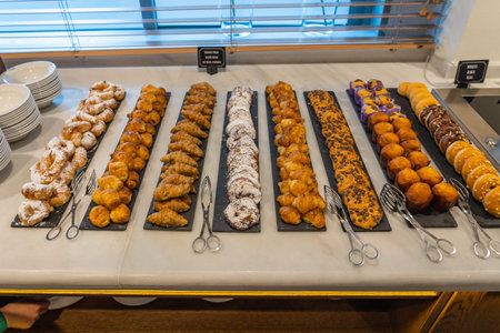 Assortment of delicious pastry beautifully arranged at buffet restaurant