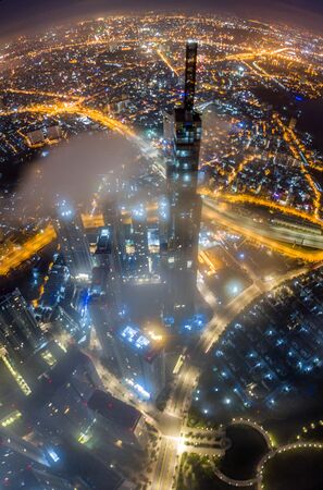 Amazing aerial view of Saigon cityscape at night with lights and buildingsの写真素材