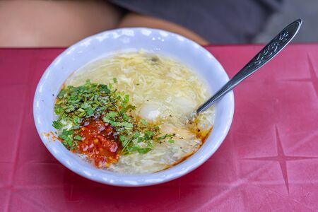 Vietnamese street food- bowl of delicious pork and quail egg soupの写真素材