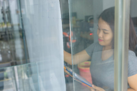 Office woman checking data on financial reportの写真素材