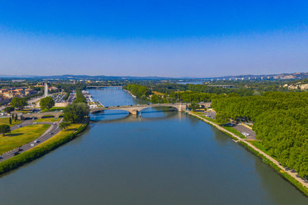 Avignon city and Rhone river under summer blue sky