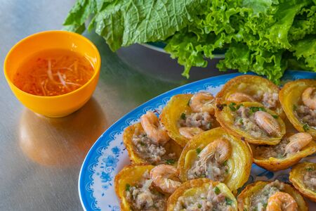 Vietnamese famous local cuisine- Banh Khot, crusty fried shrimp pancakeの写真素材
