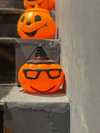 Plastic Halloween jack o lantern pumpkin heads with funny faces
