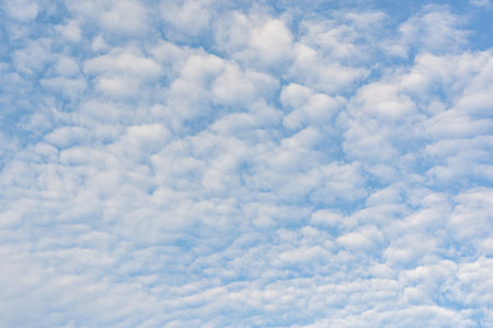 Cloudscape photo of white clouds on blue sky