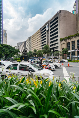 Makati, Philippines - August 2018: Vertical photo of a monument Ayala Avenue and Makati Avenue intersectionのeditorial素材