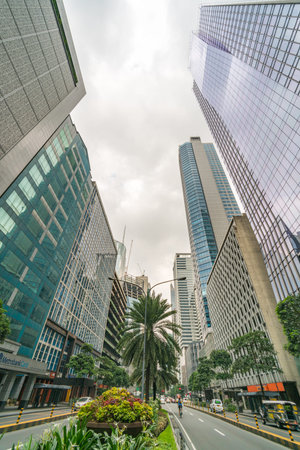 Makati, Metro Manila, Philippines - August 2018: Ayala Avenue and financial office towers in Makati...