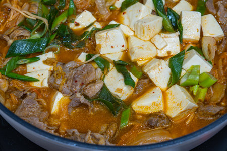 Kimchi jjigae soup and tofu, enokitake mushroomの写真素材