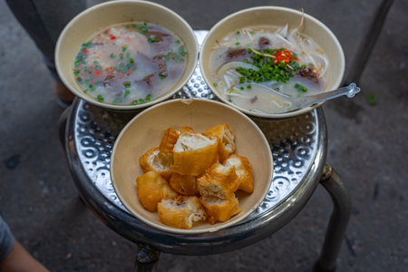 Bowls of delicious Vietnamese pig organs and bloodcake porridge