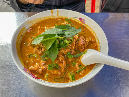 Bowl of delicious spicy satay sauce beef noodle- Vietnamese cuisineの写真素材