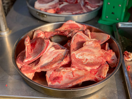 Pile of pork bone for sale at raw meat marketの写真素材