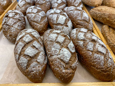 Close up photo of rye breads for sale in bakeshopの写真素材
