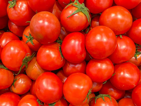 Macro photo of ripe tomatoes for backgrounds conceptの写真素材