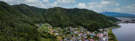 Panorama aerial view of Kawaguchi lake and mountain near lake sideの写真素材