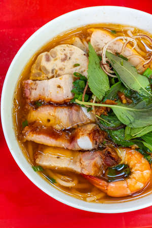 Vietnamese cuisine - Bun Mam, fish stock noodle soup served with roasted porkの写真素材