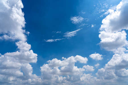 Blue sky backgrounds concept with white clouds floatingの写真素材