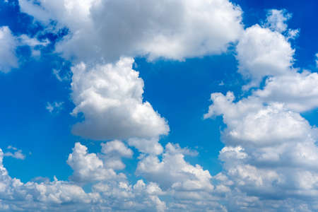 Landscape of white cumulus and clouds in the blue skyの写真素材