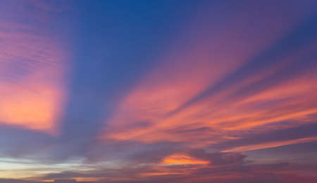 Amazing and dramatic sky at the sunsetの写真素材