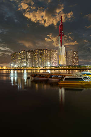 Vertical photo of Landmark 81 vinhomes central park at nightの写真素材