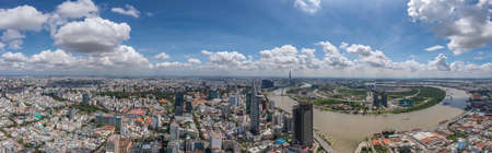 Panoramic photo of Ho Chi Minh city and Saigon river in the cloudy dayの写真素材