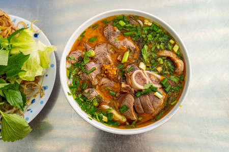 Bowl of traditional South Vietnamese noodle dish called Bun Bo Hueの写真素材