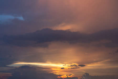 Dramatic sunset or sunrise sky with cloudsの写真素材
