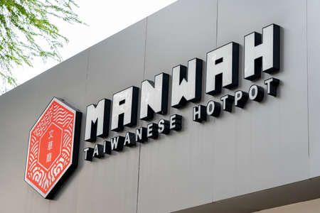 Saigon, Vietnam - 7 October 2021: Logo of Taiwanese hotpot restaurant Manwahのeditorial素材