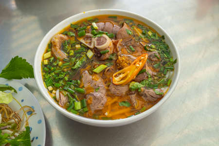 Delicious traditional Vietnamese noodles Bun Bo Hueの写真素材