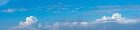 Panorama photo of blue sky and white clouds for nature backgroundsの写真素材