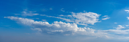 White clouds floating on the blue skyの写真素材