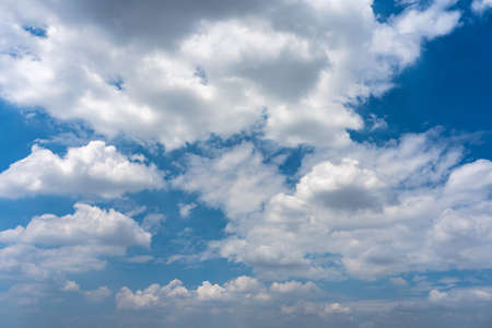 Beautiful blue sky background with white clouds floatingの写真素材