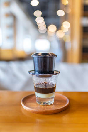Vertical photo of Vietnam retro styled condensed milk coffeeの写真素材