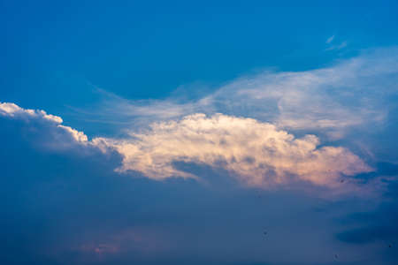 Dramatic twilight sky and clouds at summer sunsetの写真素材