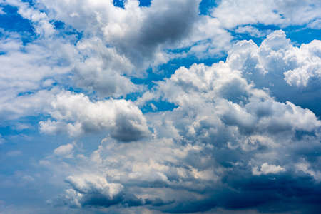 Dramatic blue sky and stratocumulus white clouds for backgroundsの写真素材