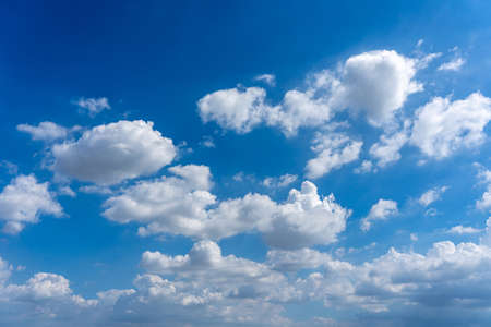 Beautiful blue sky with white cumulus clouds floatingの写真素材