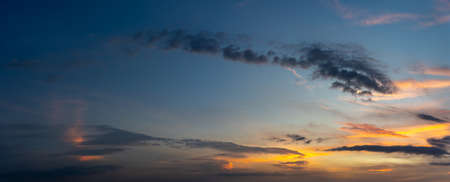 Panorama photo of orange sunset sky backgroundの写真素材