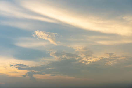 Nature background of clouds on blue sky and orange sunsetの写真素材