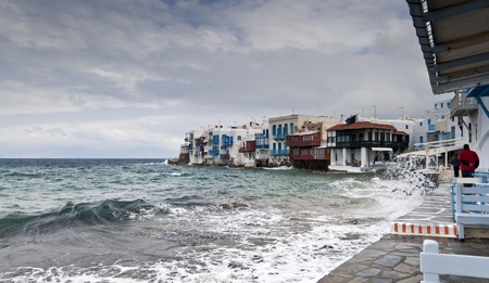 Cold day in Small Venice of Mykonos island with sea wavesの写真素材
