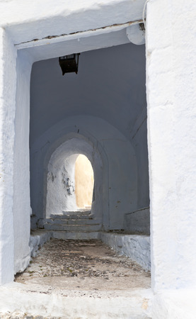 Whitewashed entrance with two portals to the Old Townの写真素材