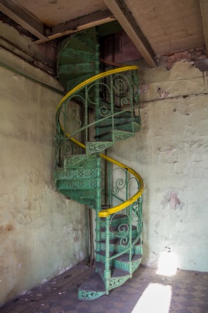 Spiral staircase in an abandoned Voronezh Distilleryの写真素材