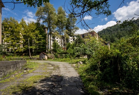 Abandoned mining ghost-town Polyana, Abkhazia. Destroyed empty houses, remnant of The Georgian-Abkhazian warの写真素材