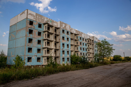 Abandoned five-story house in ghost-town, summer, Russia, Samara regionの写真素材