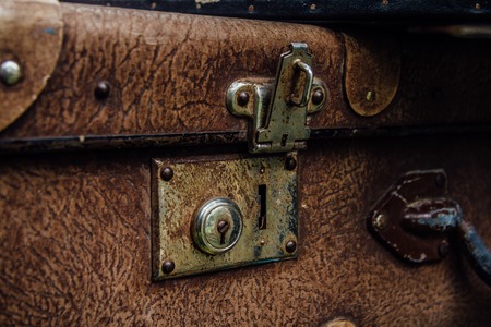 Old rusty vintage suitcase lockの写真素材